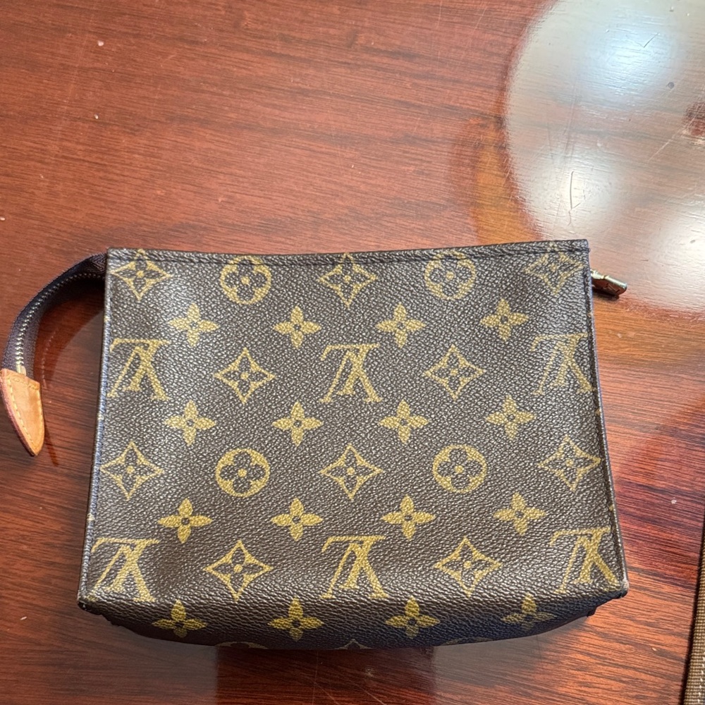 Louis Vuitton Black and Gold Monogram Pouch